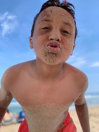 Portrait of mid adult man on beach