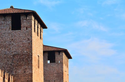 Low angle view of old building against sky