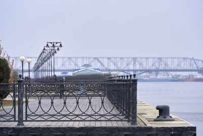 Bridge over river against clear sky