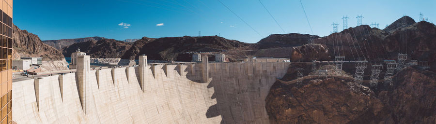 Panoramic view of hoover dam on sunny day