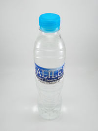 Close-up of water bottle against white background