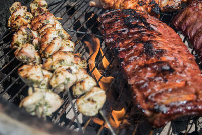 Close-up of meat on barbecue grill