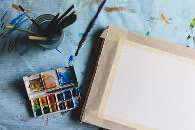 High angle view of paper on table