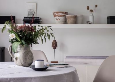 Potted plant on table at home