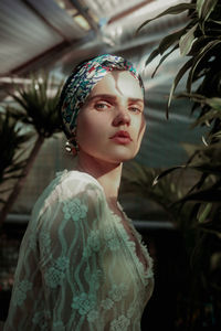 Portrait of young woman looking away