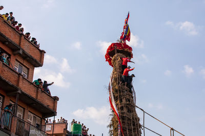 Devotees pull chariots as they take part in the festivities to mark the rato machindranath chariot.