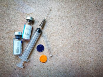 High angle view of medical supplies on table