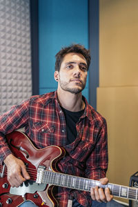 Young man playing guitar