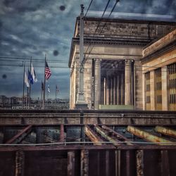 Low angle view of flags at night