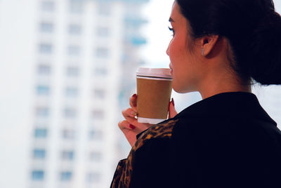 Portrait of man drinking coffee