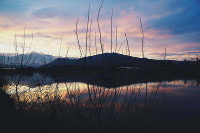 Scenic view of lake during sunset