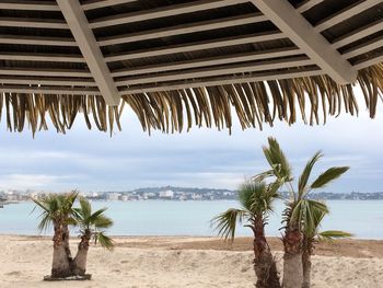 View of calm beach against the sky