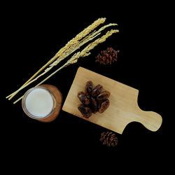 High angle view of food on table against black background