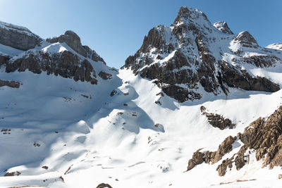 Panoramic view of snowy mountains in a sunny days of the pyrenees