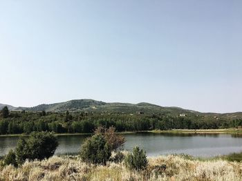 Scenic view of lake against clear sky