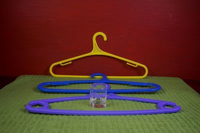 High angle view of blue paint on table against wall