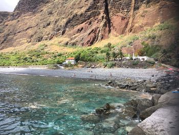 Scenic view of waterfall on cliff