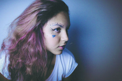 Studio shot of girl in face paint