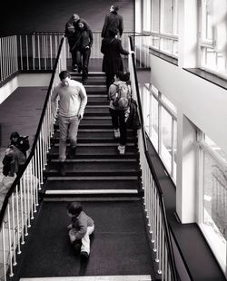 Woman standing on staircase