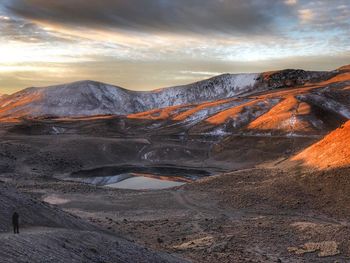 Scenic view of landscape against sky during sunset