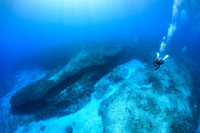 Person swimming in sea