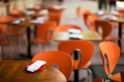 Close-up of empty seats on table