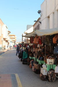 People on street market in city