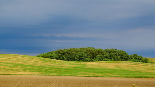 Scenic view of land against sky