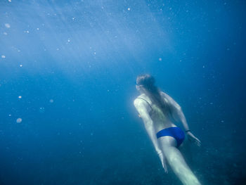 Man swimming in sea