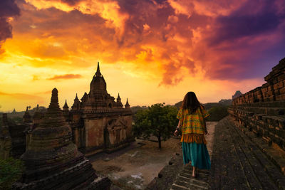 Panoramic view of temple against sky during sunset