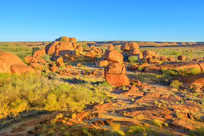 Scenic view of rock formations against clear sky