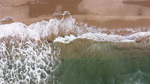 Sea waves splashing on shore