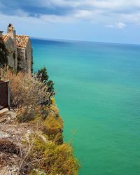 Scenic view of sea against blue sky