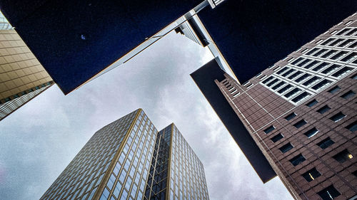 Low angle view of modern buildings in city