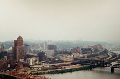 High angle view of cityscape in foggy weather