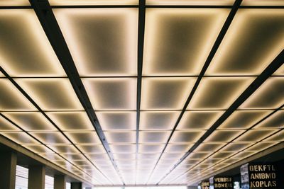 Low angle view of illuminated ceiling at airport