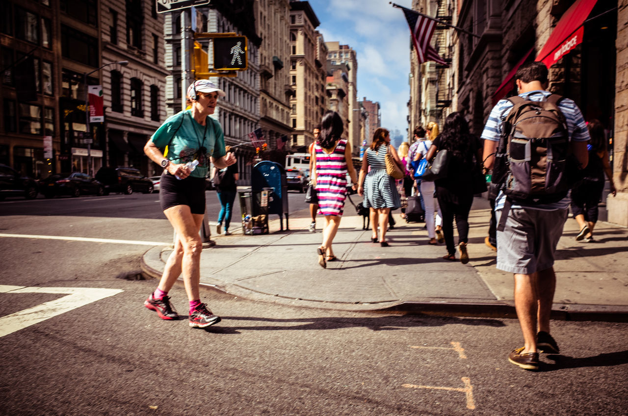 WOMAN WALKING ON STREET