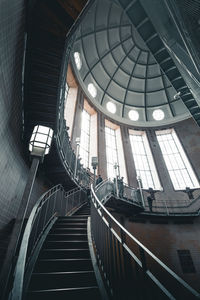 Low angle view of spiral staircase in building