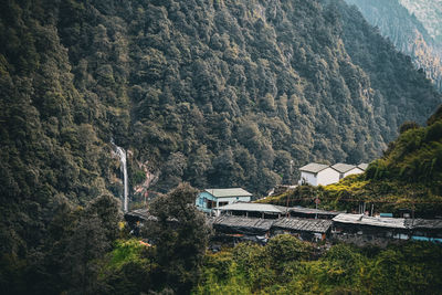 High angle view of townscape by mountain