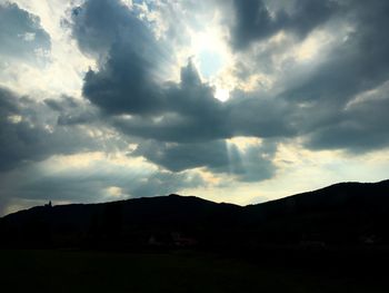 Scenic view of silhouette landscape against sky during sunset