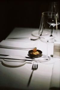 Close-up of wineglass on table