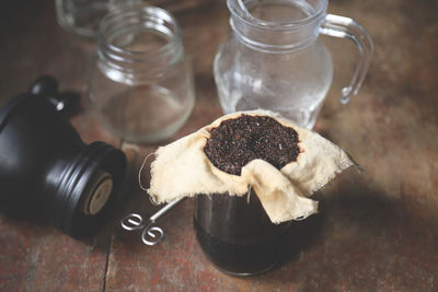 High angle view of cookies in jar on table