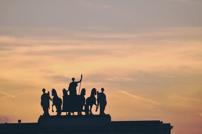 Low angle view of cloudy sky at sunset