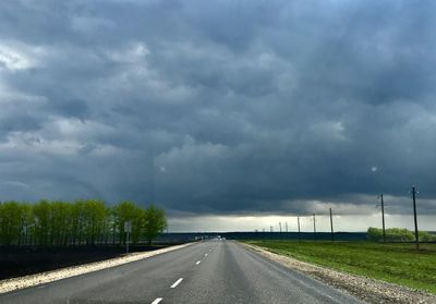 Road against cloudy sky