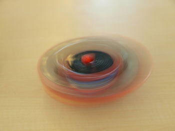 High angle view of multi colored glass on table