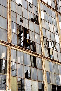 Broken windows in abandoned warehouse