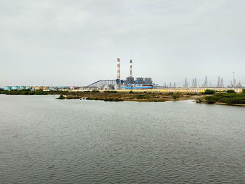 View of factory against sky