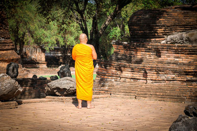 Rear view of a man in a temple