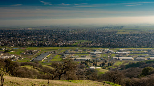 Aerial view of city against sky