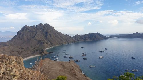 High angle view of boats in sea against sky